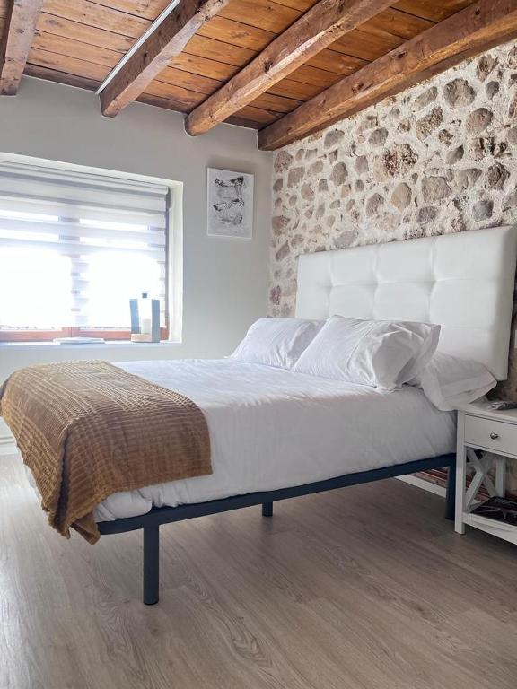 Postel nebo postele na pokoji v ubytování Apartamentos Numancia