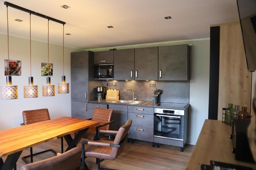 Η κουζίνα ή μικρή κουζίνα στο Komfortable Ferienwohnung in der Lüneburger Heide