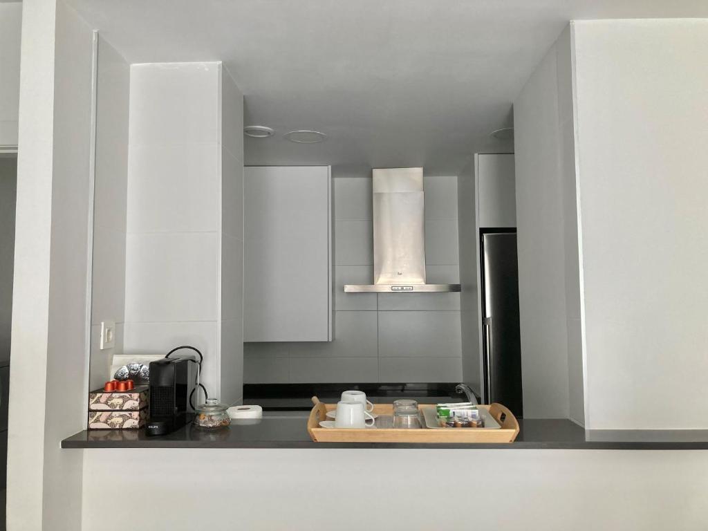 Kuchyň nebo kuchyňský kout v ubytování Apartamento centro con parking privado