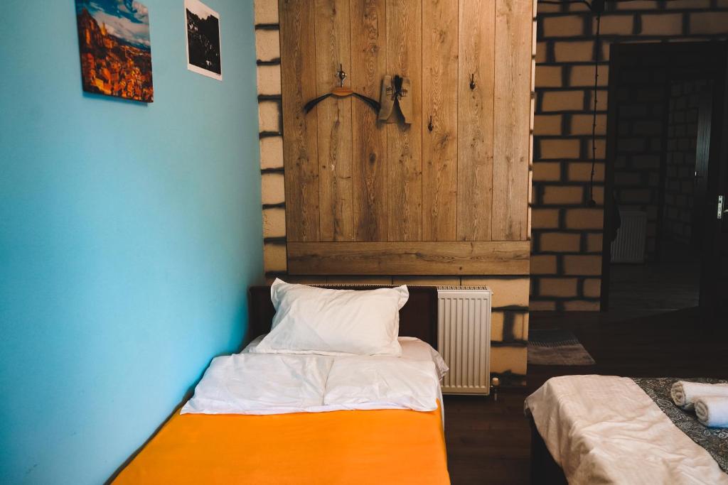 Postel nebo postele na pokoji v ubytování Fiten house