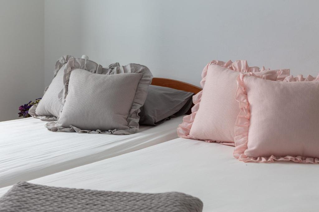 Łóżko lub łóżka w pokoju w obiekcie Maki Apartments