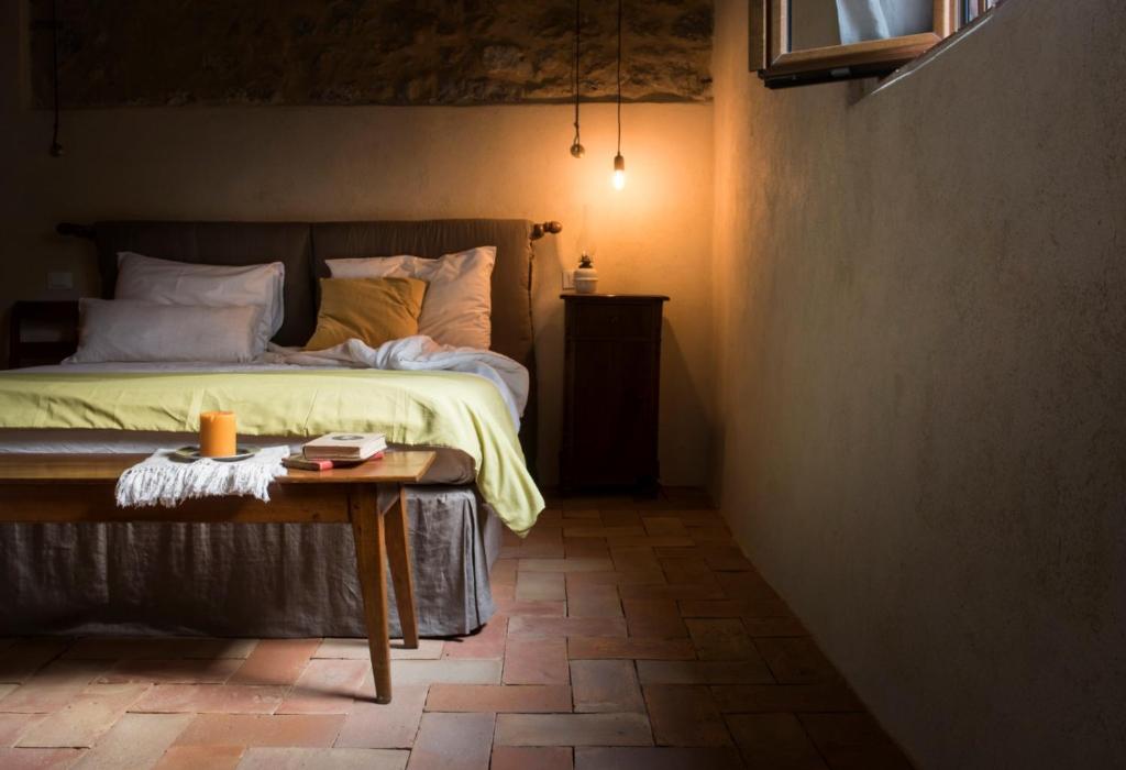 Postel nebo postele na pokoji v ubytování Agriturismo I Pini