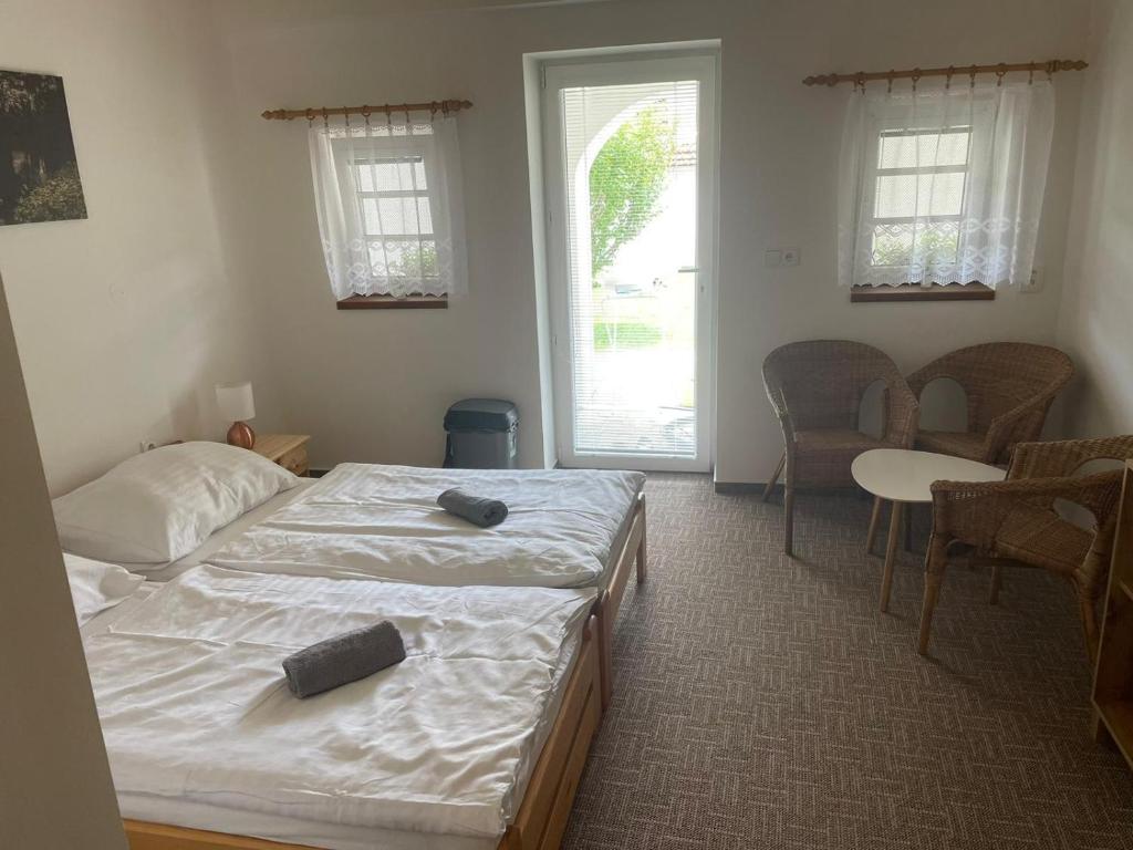 Postel nebo postele na pokoji v ubytování Apartmány u Pálavy