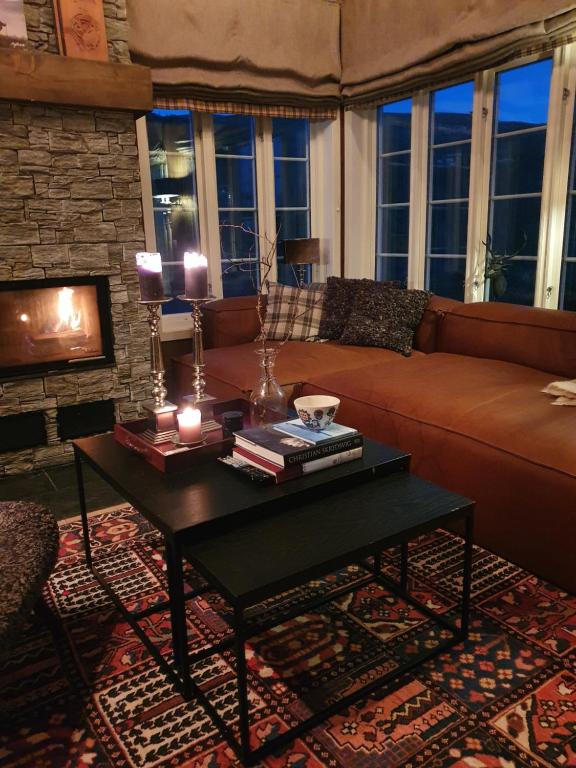 Posezení v ubytování Luxurious, well-Equipped and modern Cabin by the Cross-Country Ski Trails