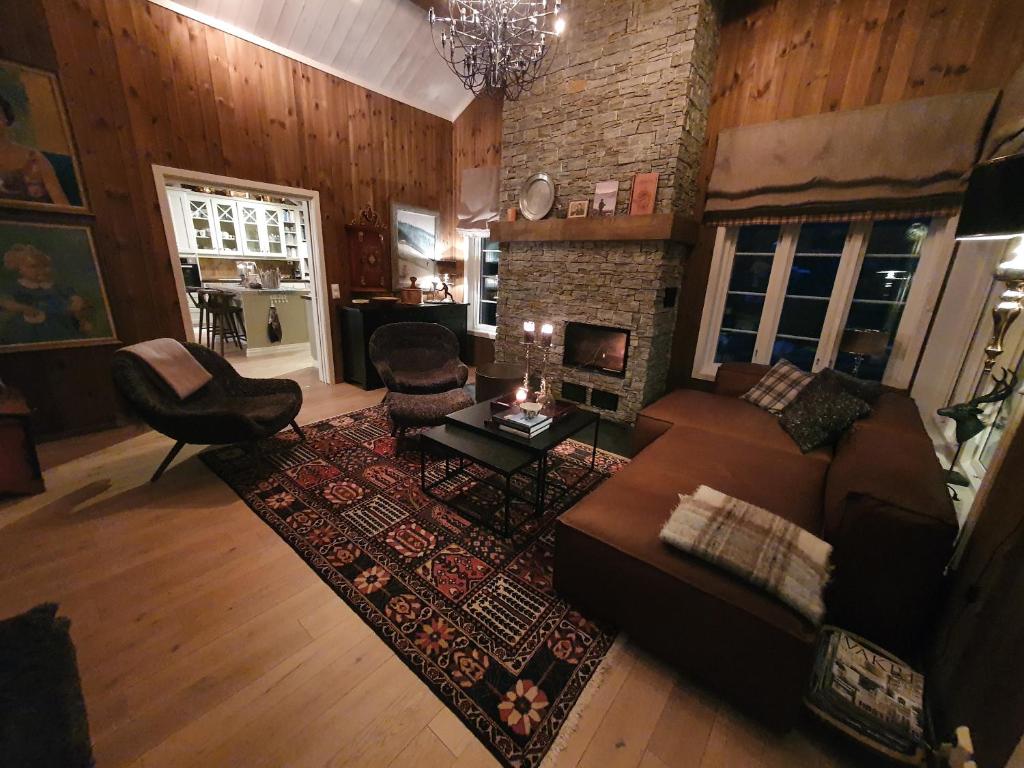 Posezení v ubytování Luxurious, well-Equipped and modern Cabin by the Cross-Country Ski Trails
