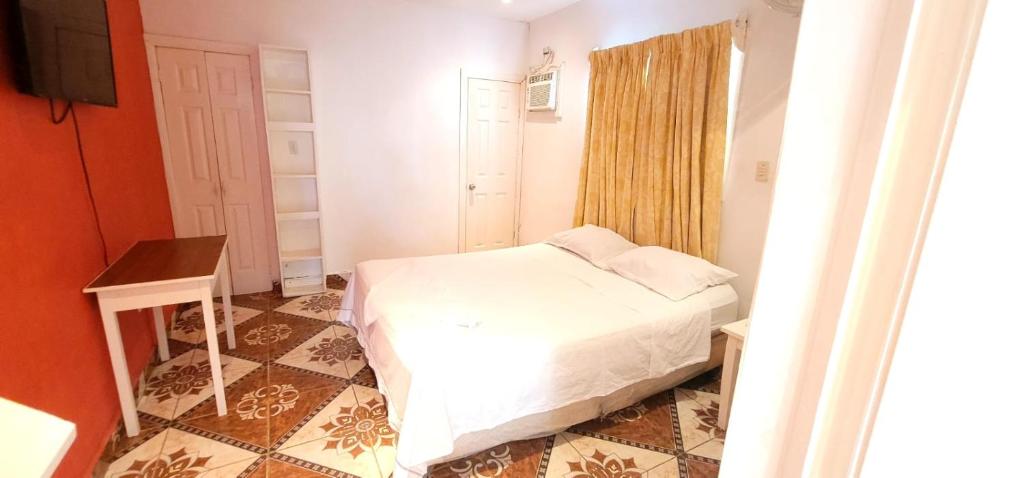 Postel nebo postele na pokoji v ubytování Villa Trinidad