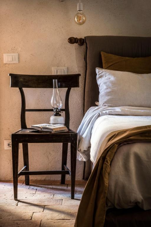 Postel nebo postele na pokoji v ubytování Agriturismo I Pini