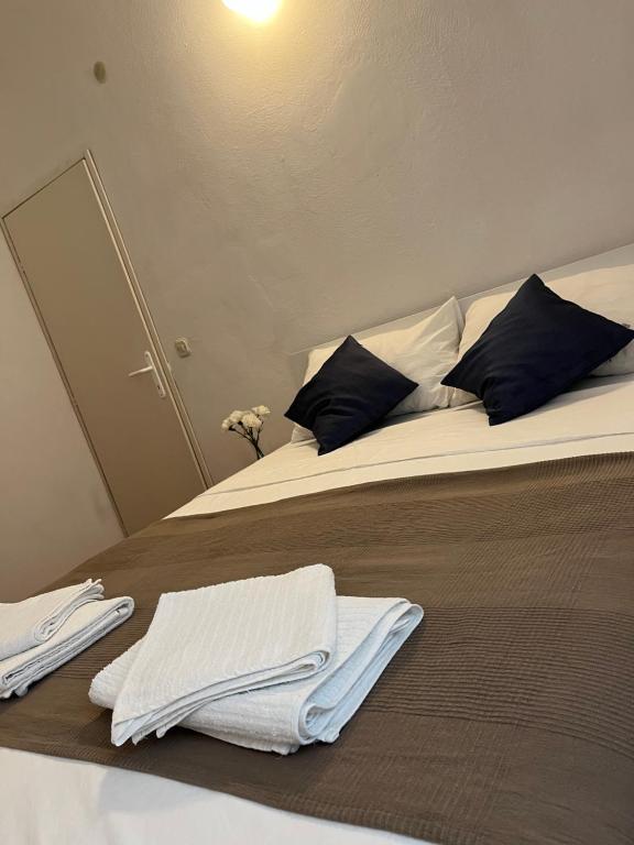 Posteľ alebo postele v izbe v ubytovaní Apartman Gabrijel