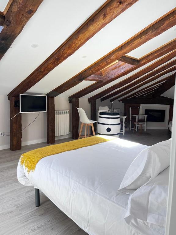 Postel nebo postele na pokoji v ubytování Apartamentos Numancia