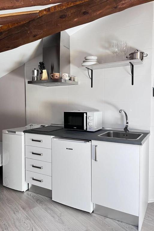 Kuchyň nebo kuchyňský kout v ubytování Apartamentos Numancia
