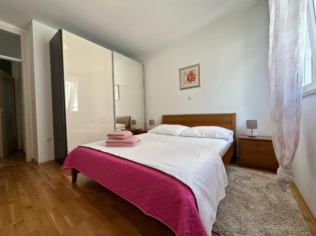Postel nebo postele na pokoji v ubytování Apartment HAPPY HOME
