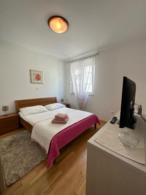 Postel nebo postele na pokoji v ubytování Apartment HAPPY HOME