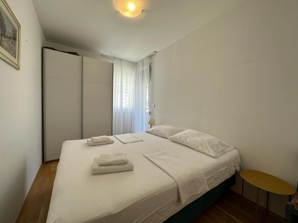 Postel nebo postele na pokoji v ubytování Apartment HAPPY HOME