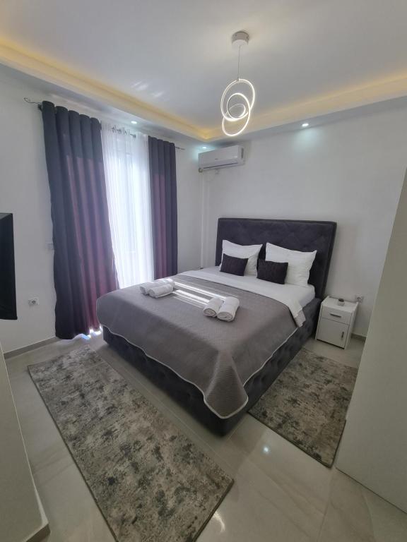 Postel nebo postele na pokoji v ubytování Kahari Apartments