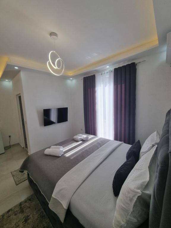 Postel nebo postele na pokoji v ubytování Kahari Apartments