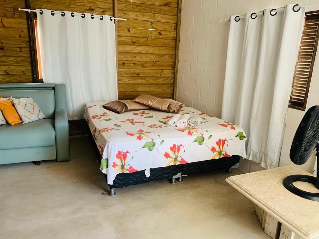 Postel nebo postele na pokoji v ubytování Suítes Cabanas Coral