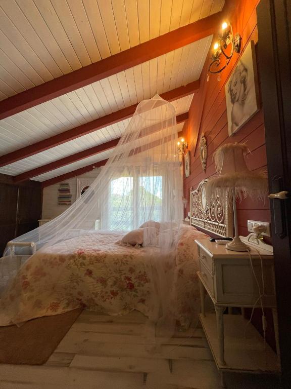 Postel nebo postele na pokoji v ubytování VILLA LAURA