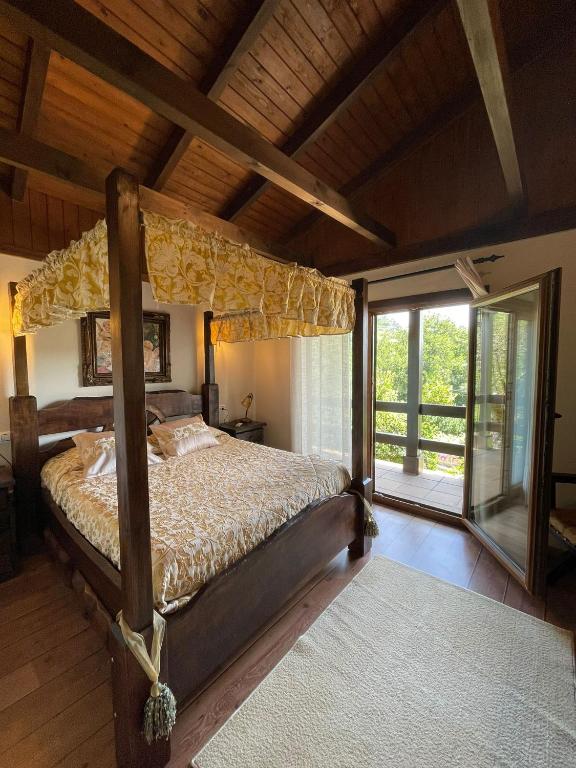 Postel nebo postele na pokoji v ubytování VILLA LAURA