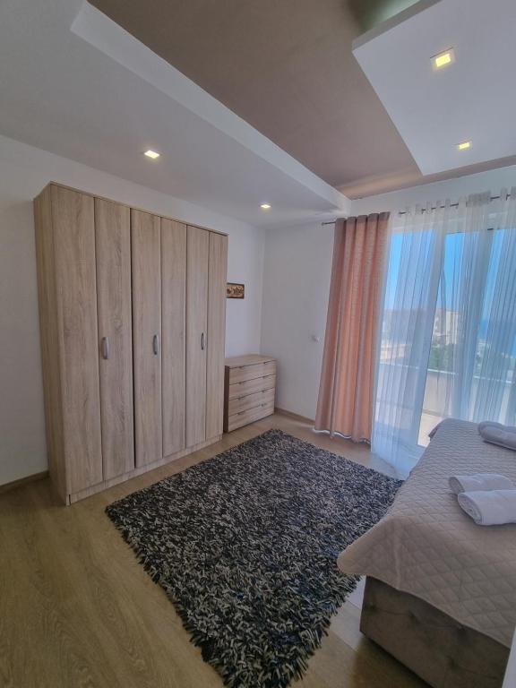 Postel nebo postele na pokoji v ubytování Kahari Apartments