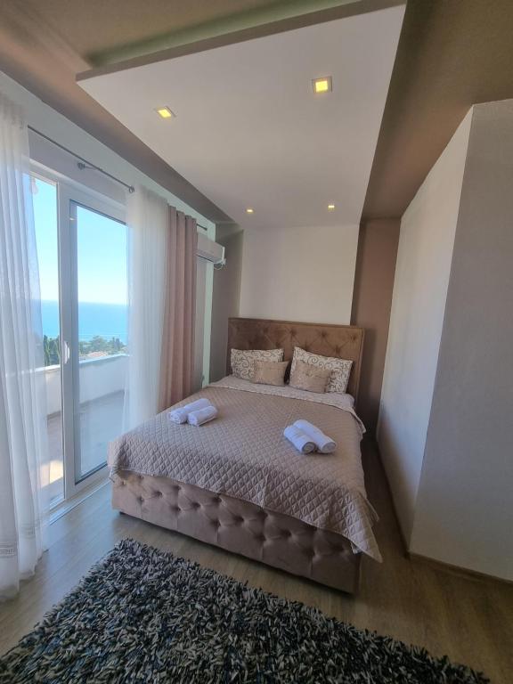 Postel nebo postele na pokoji v ubytování Kahari Apartments