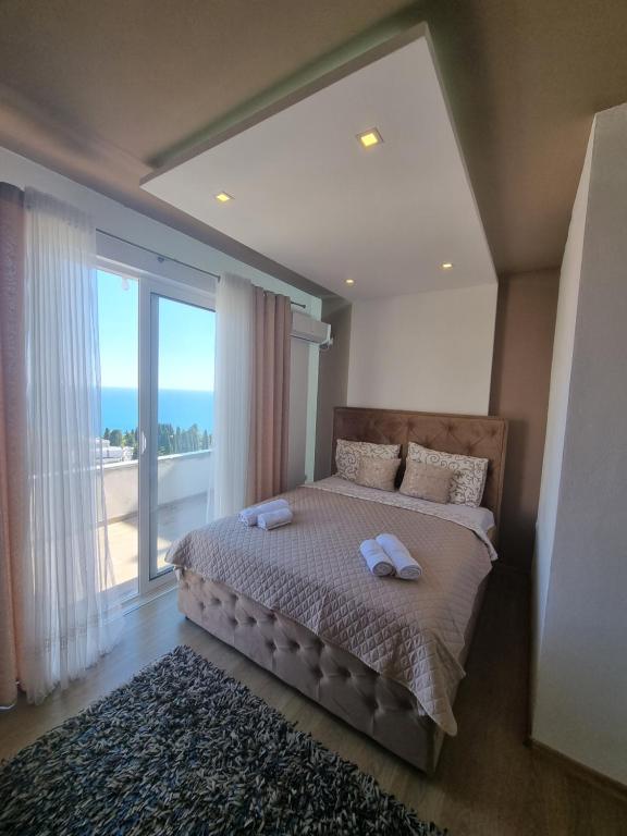 Postel nebo postele na pokoji v ubytování Kahari Apartments