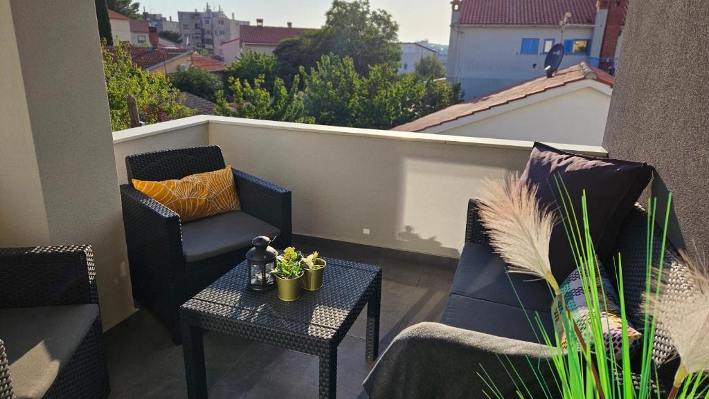 Posedenie v ubytovaní Eximius Apartment