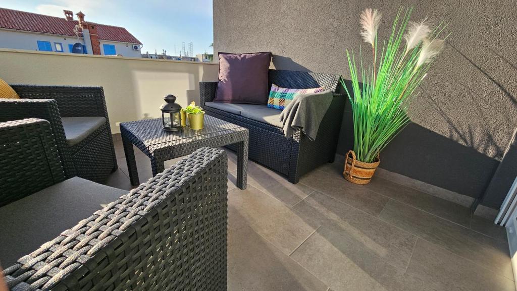 Posedenie v ubytovaní Eximius Apartment