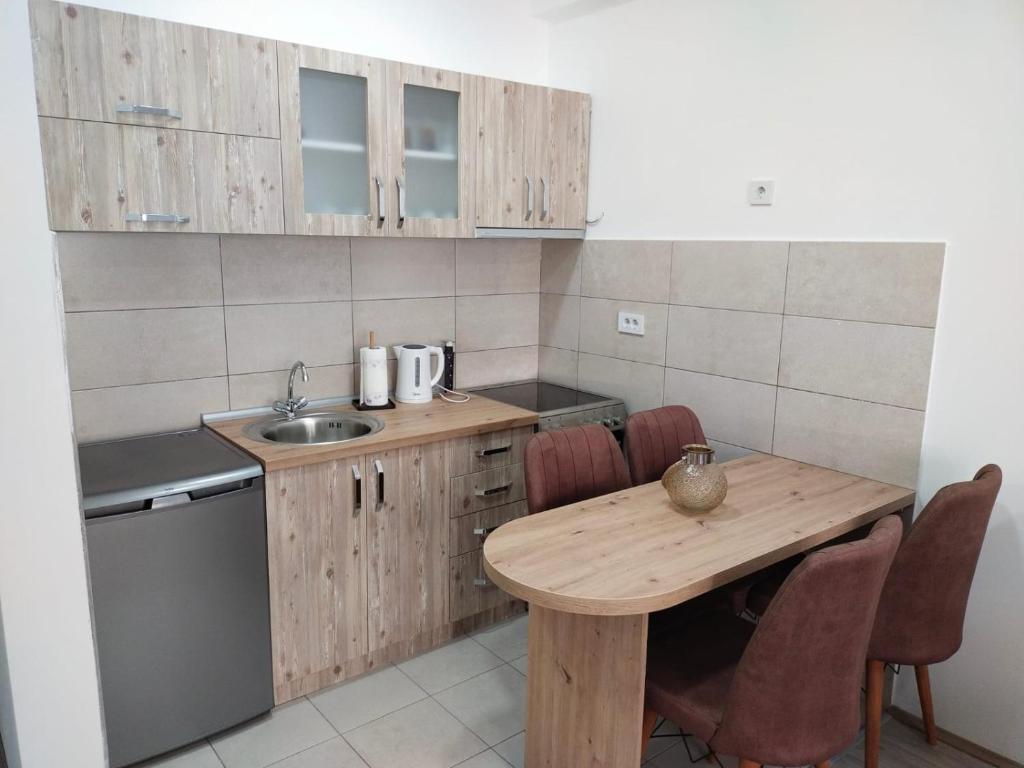 Kuchyň nebo kuchyňský kout v ubytování Garden Hill Apartment