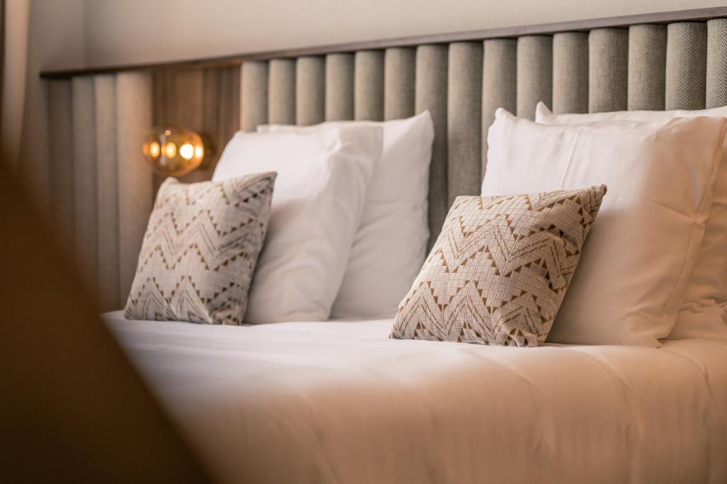 Postel nebo postele na pokoji v ubytování Hotel Du Parc