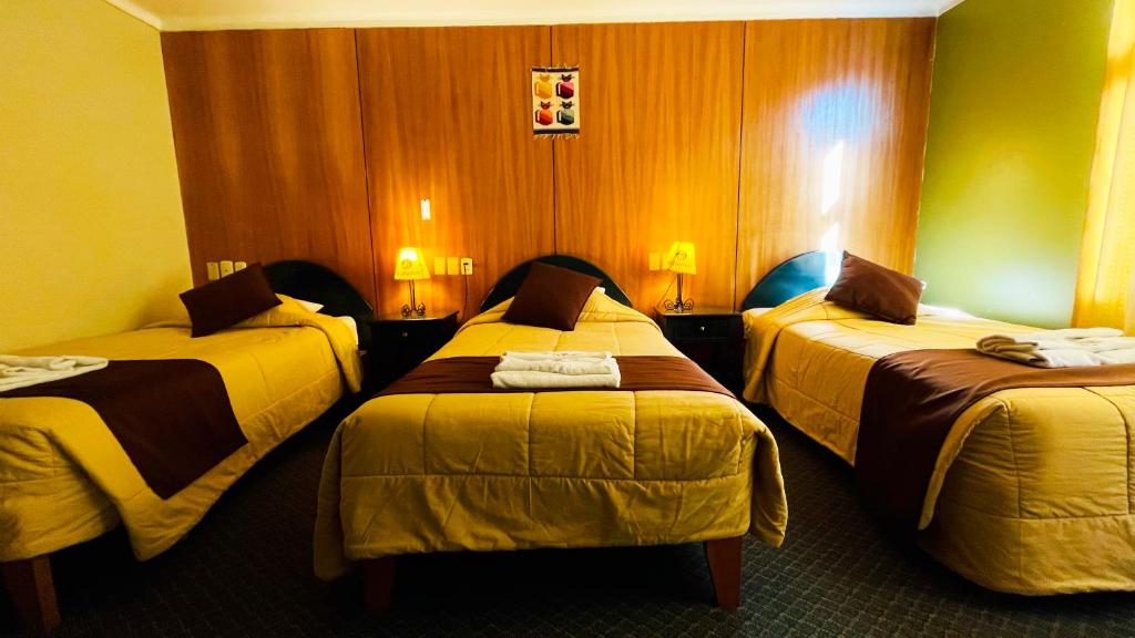 Postel nebo postele na pokoji v ubytování Hostel Sillustani Inn Puno