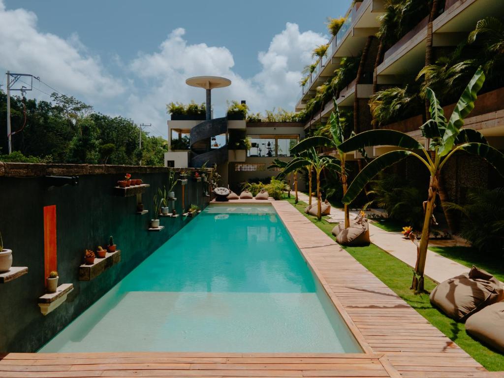 สระว่ายน้ำที่อยู่ใกล้ ๆ หรือใน Xamira Tulum Luxury Condo