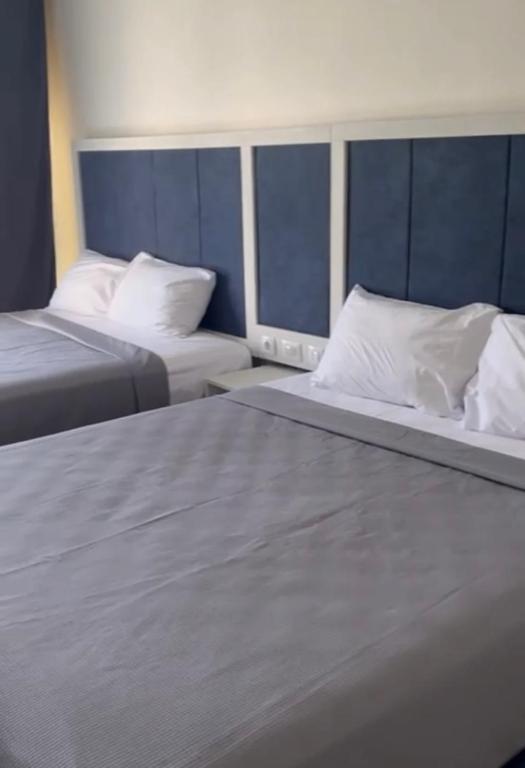 Postel nebo postele na pokoji v ubytování Marassi Northcoast