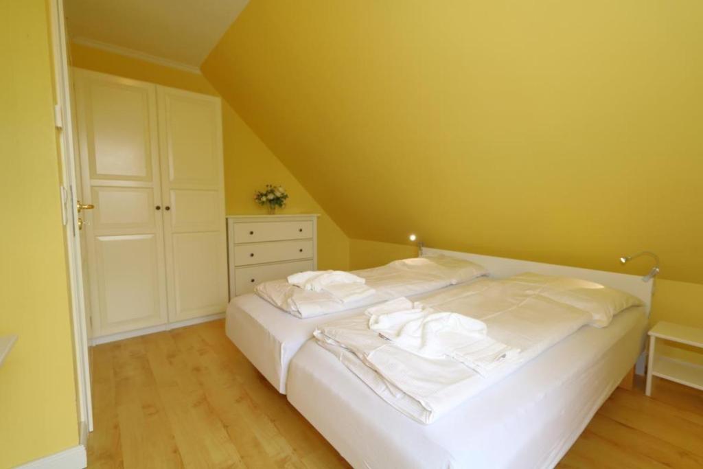 Postel nebo postele na pokoji v ubytování Landhaus-Friedrichshain-Thomas-Mann