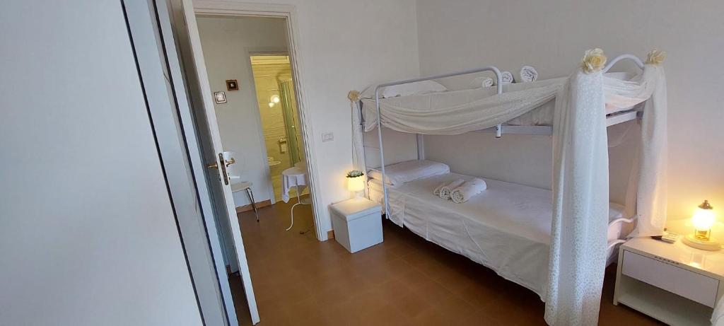 A bed or beds in a room at Casa di Sofia