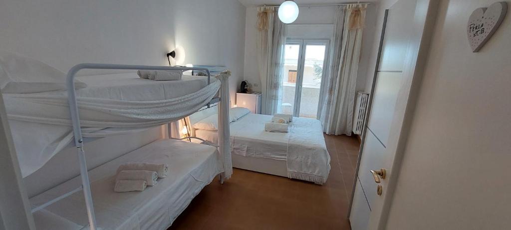 A bed or beds in a room at Casa di Sofia