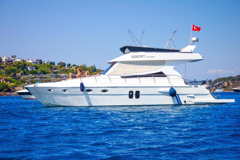 a white boat in the water with people on it at Azul Yachting in Bodrum City