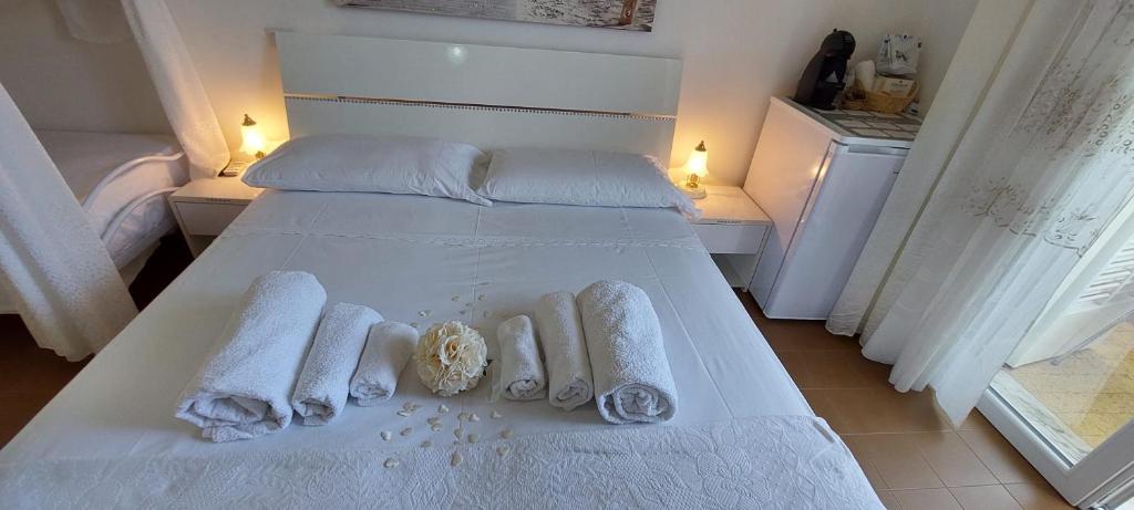 A bed or beds in a room at Casa di Sofia