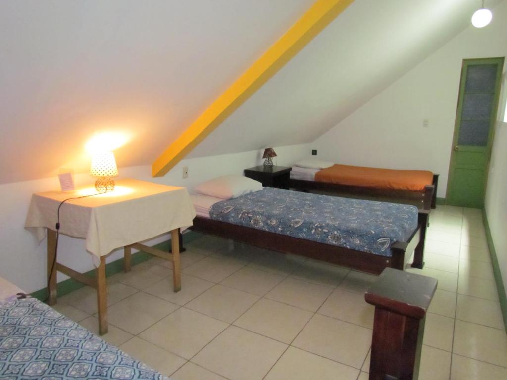 Postel nebo postele na pokoji v ubytování Hostel Shakti