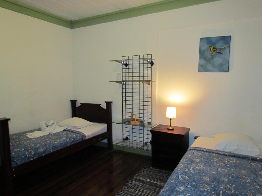 Postel nebo postele na pokoji v ubytování Hostel Shakti