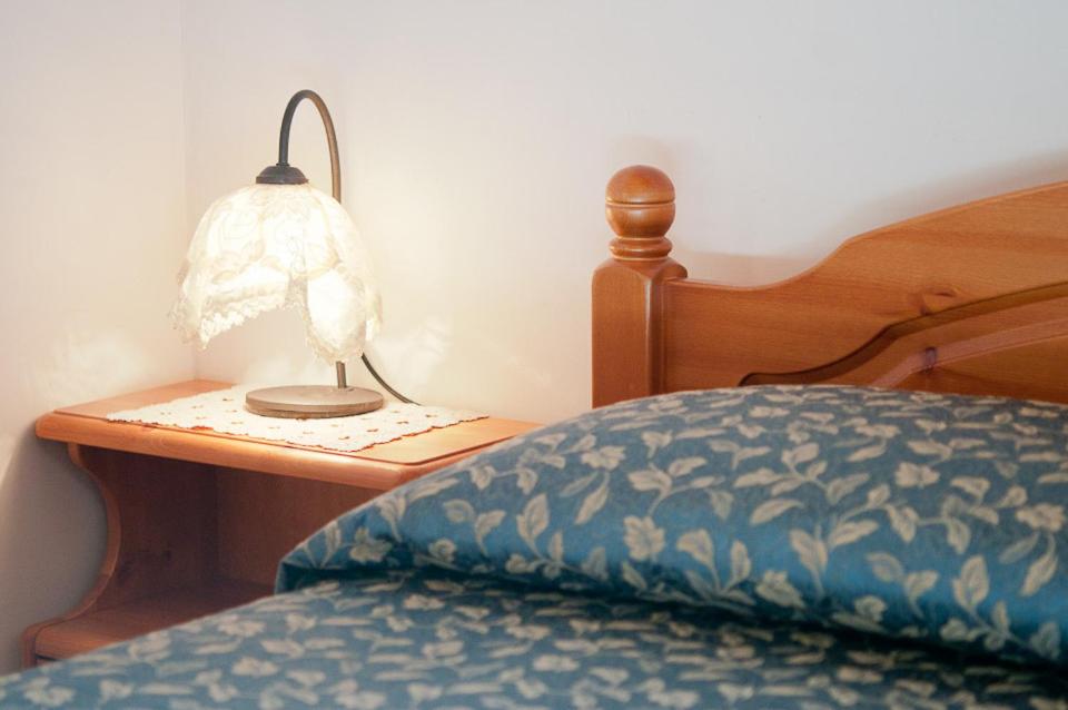 Postel nebo postele na pokoji v ubytování Appartamenti De Sanctis