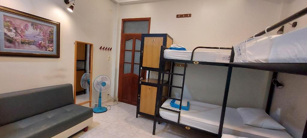 Postel nebo postele na pokoji v ubytování Long Hostel