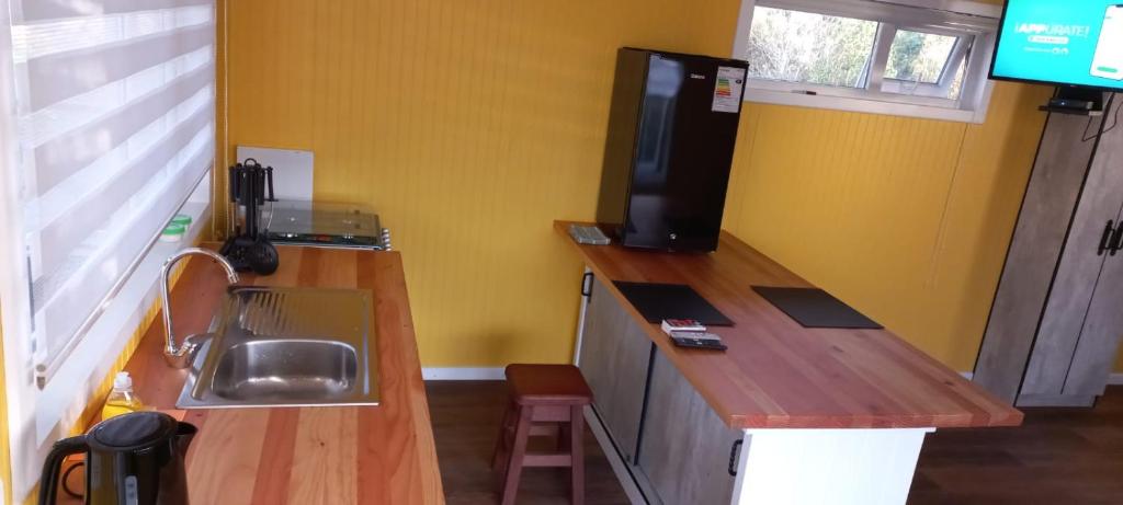 A cozinha ou kitchenette de Cabañas Quimantu-Aguas Calientes