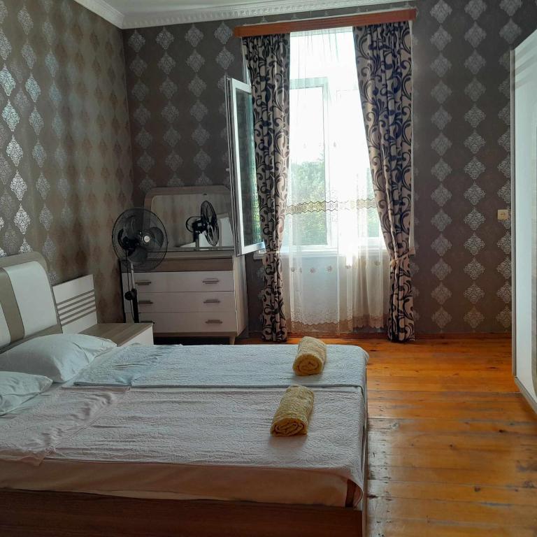 Postel nebo postele na pokoji v ubytování Ani's Green House
