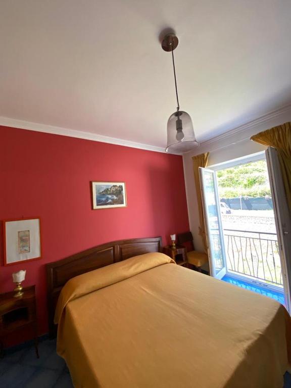 Postel nebo postele na pokoji v ubytování B&B Lunaponzese-Ponza centro