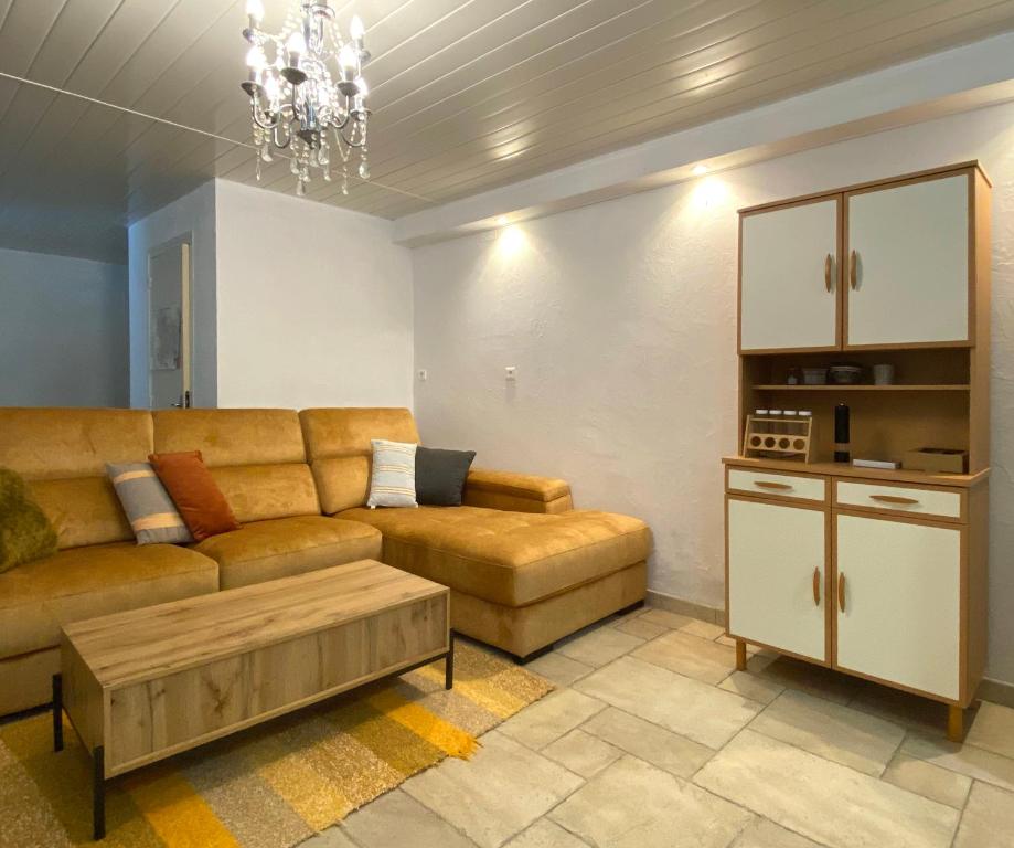 Posezení v ubytování Appartement avec accès privé à la rivière