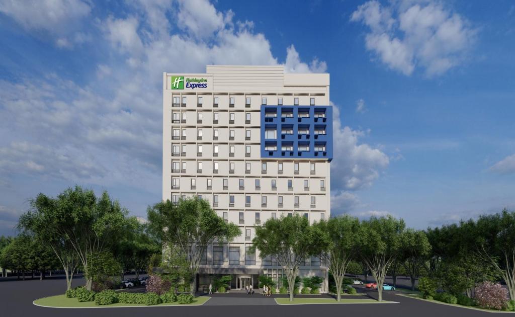 a rendering of a white building with a sign on top at Holiday Inn Express Shanghai Pudong Airport, an IHG Hotel in Shanghai