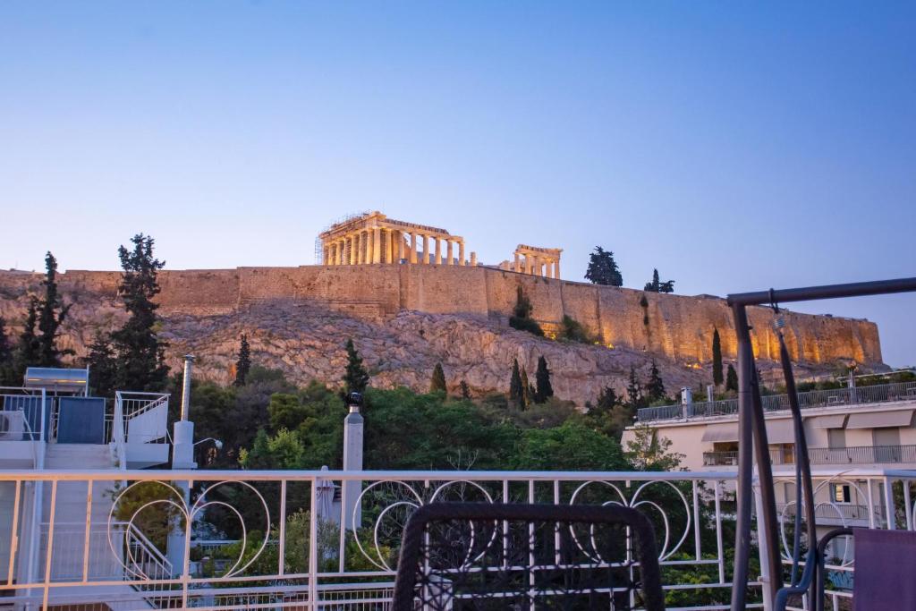 a view of a building on a hill at Polymnia & Melpomene by Heloni Apartments in Athens