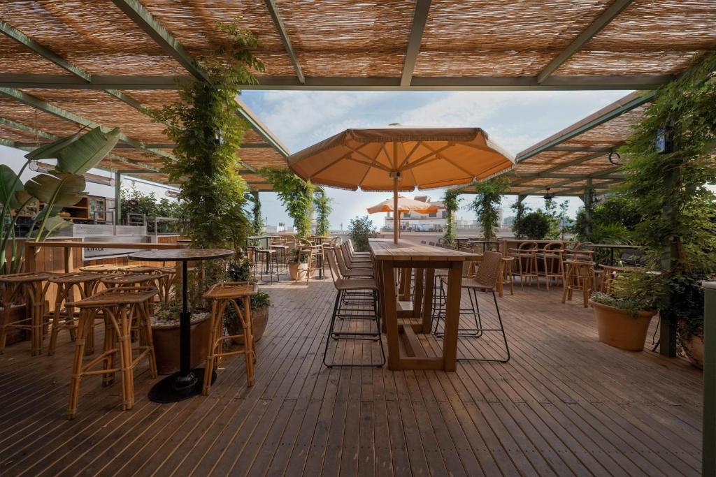 Reštaurácia alebo iné gastronomické zariadenie v ubytovaní Hotel Pulitzer Barcelona