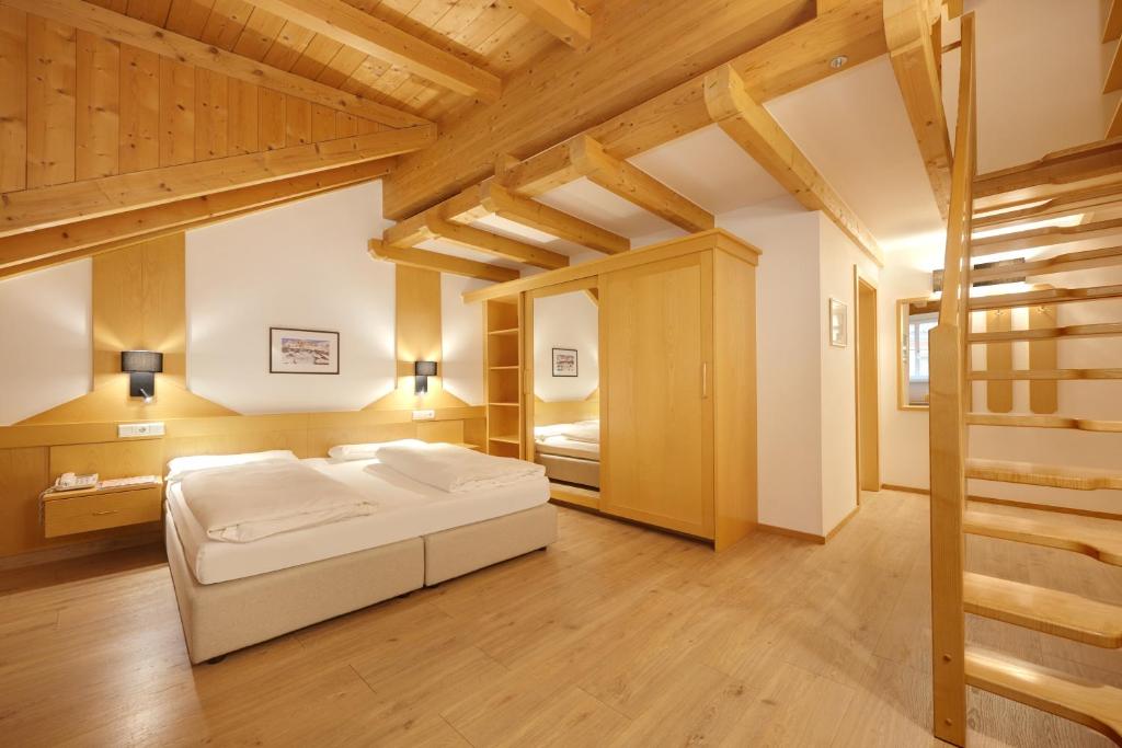Postel nebo postele na pokoji v ubytování Hotel Goldene Rose