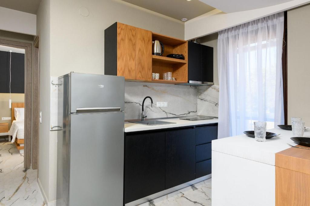 Kuchyň nebo kuchyňský kout v ubytování Olea Luxury Villa